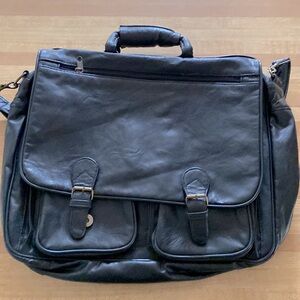 Laptop bag 19 inch length by 15 width.  Synthetic leather.